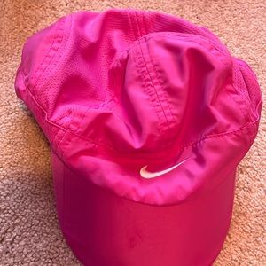 Hi! This is purple, white, and black Nike hat.